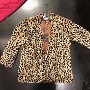 Faux fur cheetah print fur jacket.